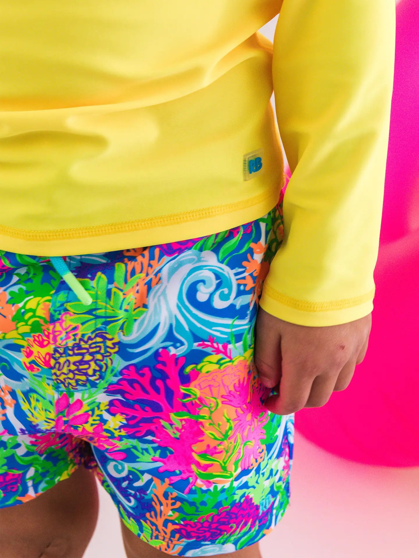 Neon Coral Swim Trunks